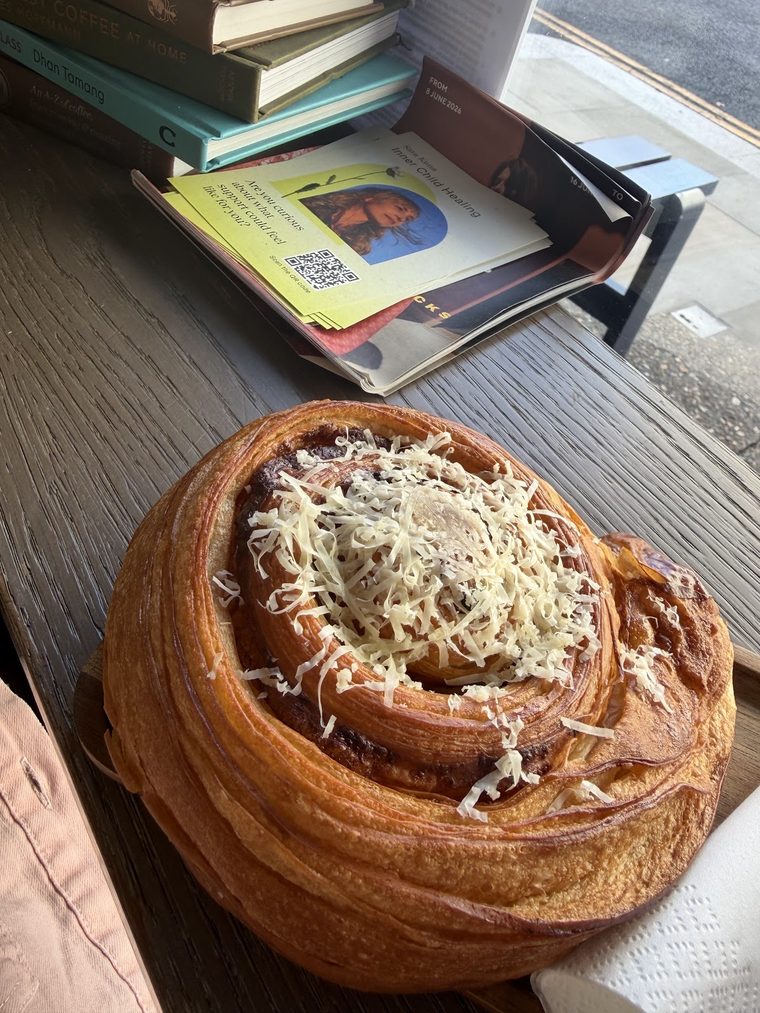 Savoury cheese-topped swirl pastry